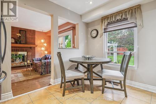 2693 Quill Crescent, Mississauga, ON - Indoor Photo Showing Dining Room With Fireplace