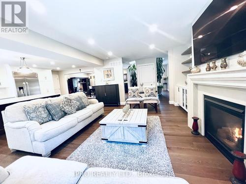 6 Edgecombe Terrace, Springwater, ON - Indoor Photo Showing Living Room With Fireplace