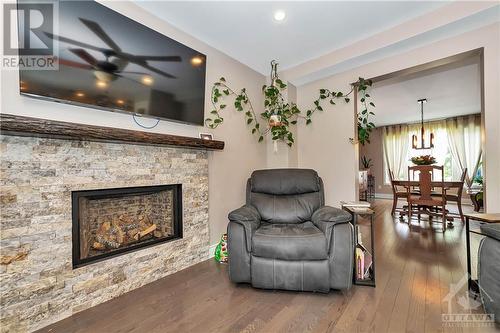 1736 Caminiti Crescent, Orleans, ON - Indoor Photo Showing Living Room With Fireplace