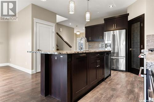 27 College Crescent, White City, SK - Indoor Photo Showing Kitchen With Upgraded Kitchen