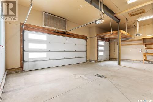 27 College Crescent, White City, SK - Indoor Photo Showing Garage