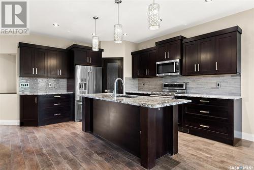 27 College Crescent, White City, SK - Indoor Photo Showing Kitchen With Upgraded Kitchen