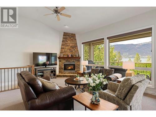 11150 Maddock Avenue, Lake Country, BC - Indoor Photo Showing Living Room With Fireplace