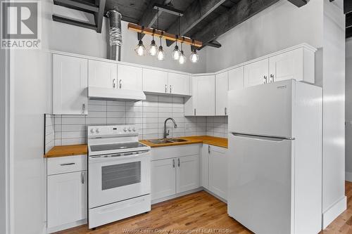 3150 Sandwich Unit# 1, Windsor, ON - Indoor Photo Showing Kitchen With Double Sink