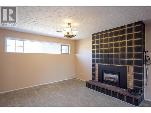 945 Rumney Road, West Kelowna, BC - Indoor With Fireplace