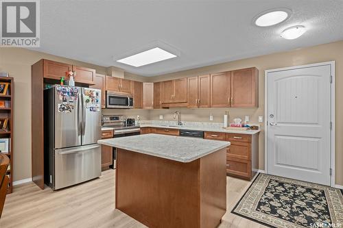 406 2781 Woodbridge Drive, Prince Albert, SK - Indoor Photo Showing Kitchen With Stainless Steel Kitchen With Double Sink