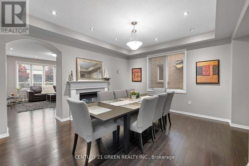744 Sales Court, Milton, ON - Indoor Photo Showing Dining Room With Fireplace