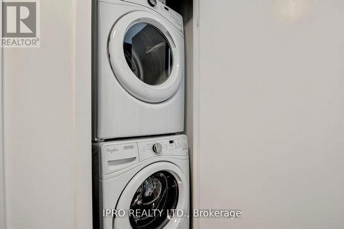 1313 - 30 Shore Breeze Drive, Toronto, ON - Indoor Photo Showing Laundry Room