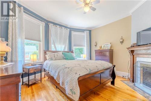 64 Union Street, St. Stephen, NB - Indoor Photo Showing Bedroom With Fireplace