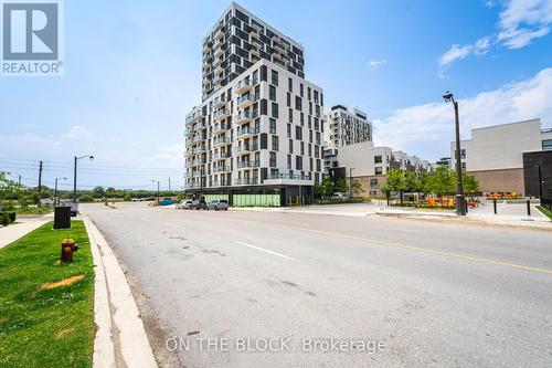 317 - 335 Wheat Boom Drive, Oakville, ON - Outdoor With Facade