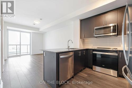 317 - 335 Wheat Boom Drive, Oakville, ON - Indoor Photo Showing Kitchen With Stainless Steel Kitchen