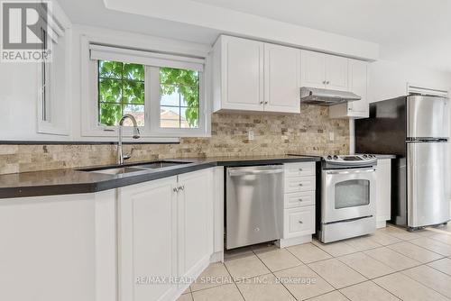 5694 Jenvic Grove, Mississauga, ON - Indoor Photo Showing Kitchen With Stainless Steel Kitchen With Double Sink