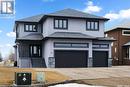 22 Aspen Village Drive, Emerald Park, SK  - Outdoor With Facade 