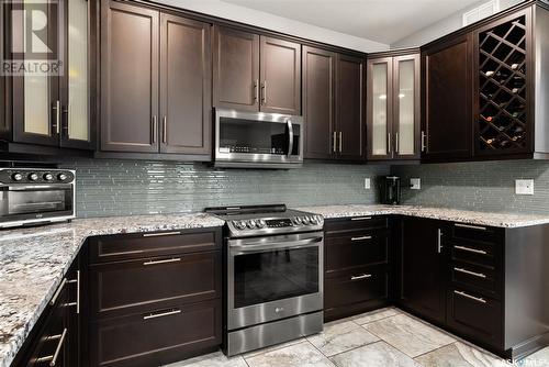 22 Aspen Village Drive, Emerald Park, SK - Indoor Photo Showing Kitchen With Upgraded Kitchen