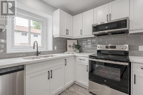 17 - 1920 Culver Drive, London, ON - Indoor Photo Showing Kitchen With Stainless Steel Kitchen With Double Sink With Upgraded Kitchen