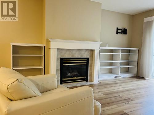 31 500 Wotzke Drive, Williams Lake, BC - Indoor Photo Showing Living Room With Fireplace
