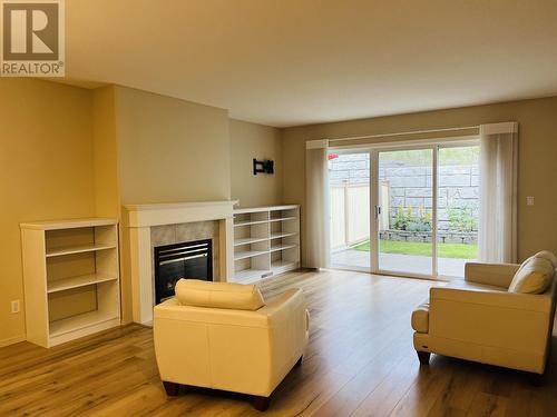 31 500 Wotzke Drive, Williams Lake, BC - Indoor Photo Showing Living Room With Fireplace