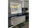315 10Th Avenue, Castlegar, BC  - Indoor Photo Showing Kitchen With Double Sink 