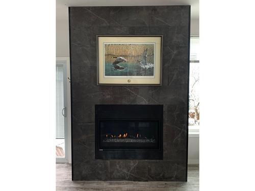 315 10Th Avenue, Castlegar, BC - Indoor Photo Showing Living Room With Fireplace