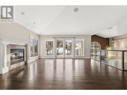 3937 Gallaghers Circle, Kelowna, BC - Indoor Photo Showing Living Room With Fireplace