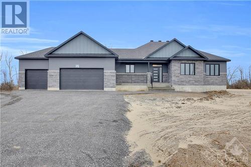 **PREVIOUS BUILD BY BUILDER - NOT HOME FOR SALE** - 132 Old Mine Road, Perth, ON - Outdoor With Facade