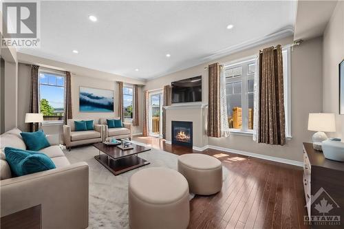 201 Livery Street, Stittsville, ON - Indoor Photo Showing Living Room With Fireplace