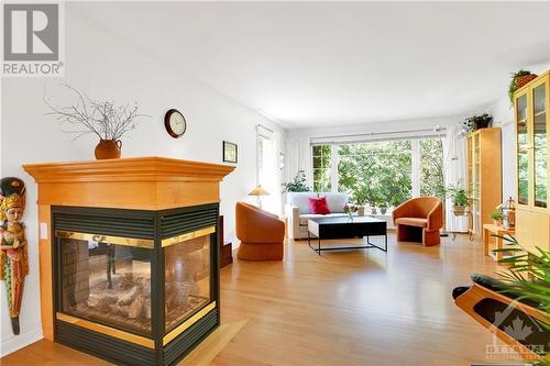 1257 Tintern Drive, Ottawa, ON - Indoor Photo Showing Living Room With Fireplace