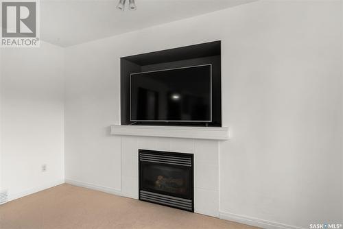 8613 Sherwood Drive, Regina, SK - Indoor Photo Showing Living Room With Fireplace