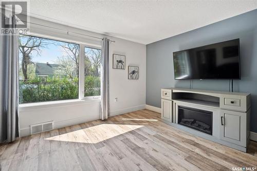 132 112Th Street W, Saskatoon, SK - Indoor Photo Showing Living Room With Fireplace