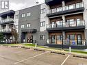 203 720 Baltzan Boulevard, Saskatoon, SK  - Outdoor With Balcony With Facade 