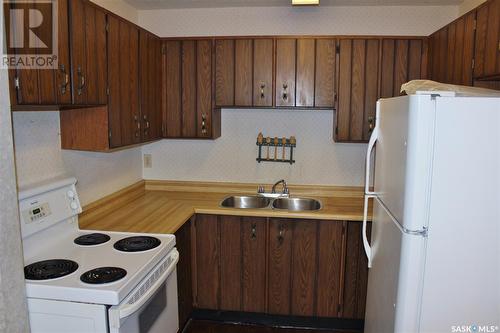 154 1128 Mckercher Drive, Saskatoon, SK - Indoor Photo Showing Kitchen With Double Sink