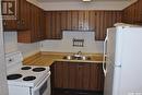 154 1128 Mckercher Drive, Saskatoon, SK  - Indoor Photo Showing Kitchen With Double Sink 