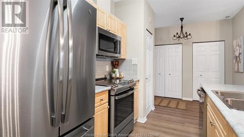 1885 Westview Park Boulevard Unit# 206, Lasalle, ON - Indoor Photo Showing Kitchen With Stainless Steel Kitchen With Double Sink With Upgraded Kitchen