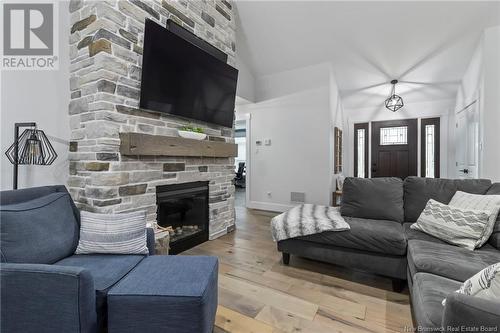 70 Route 933, Grand-Barachois, NB - Indoor Photo Showing Living Room With Fireplace