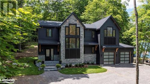 19 Todholm Drive, Port Carling, ON - Indoor Photo Showing Living Room With Fireplace