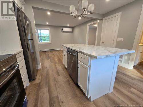 232 Bridge Road, Miramichi, NB - Indoor Photo Showing Kitchen With Fireplace