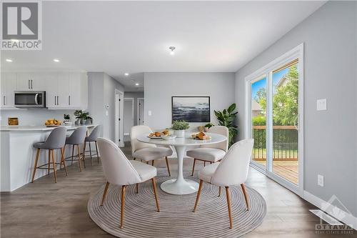 Breakfast bar and dining room **VIRTUALLY STAGED** - 24 Dollard Street, Embrun, ON - Indoor Photo Showing Dining Room