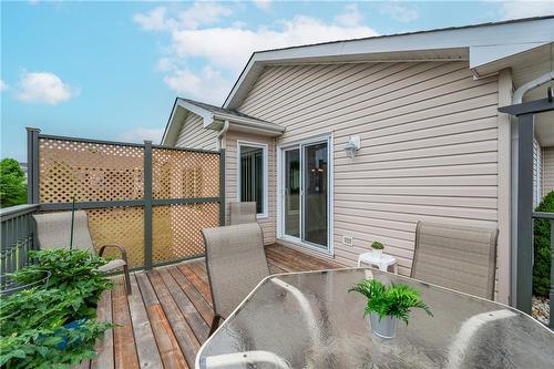 Back deck access from kitchen - 106 Portrush Court, Freelton, ON - Outdoor With Deck Patio Veranda With Exterior