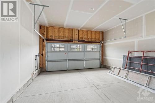 238 Kinderwood Way, Kemptville, ON - Indoor Photo Showing Garage