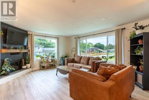 2235 Hayden Drive, Armstrong, BC - Indoor Photo Showing Living Room With Fireplace