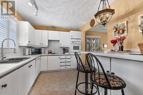 103 - 585 Atherley Road, Orillia, ON - Indoor Photo Showing Kitchen With Double Sink