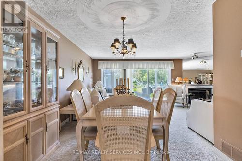 103 - 585 Atherley Road, Orillia, ON - Indoor Photo Showing Dining Room With Fireplace