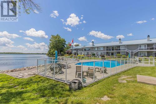 103 - 585 Atherley Road, Orillia, ON - Outdoor With Body Of Water With In Ground Pool