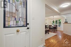 The new door offers an elegant prairie style window. - 