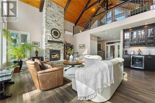 597 Point Trail, Westmeath, ON - Indoor Photo Showing Living Room With Fireplace