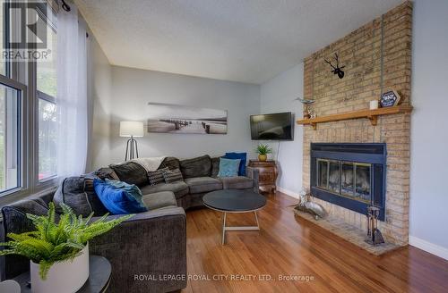 121 Parkside Drive W, Centre Wellington, ON - Indoor Photo Showing Living Room With Fireplace