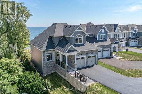 16 Twelve Trees Court, Prince Edward County (Wellington), ON - Outdoor With Facade