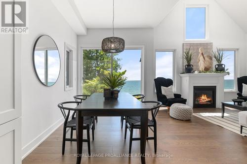 16 Twelve Trees Court, Prince Edward County (Wellington), ON - Indoor Photo Showing Dining Room With Fireplace