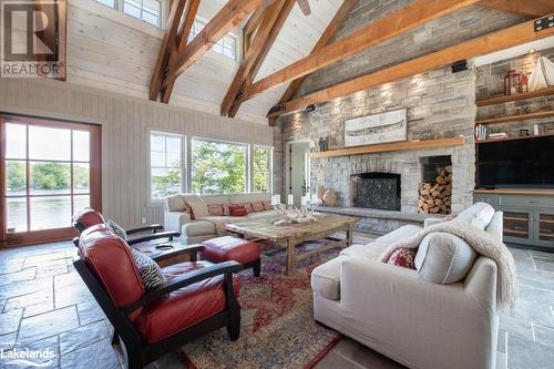 68 Island 120, Port Severn, ON - Indoor Photo Showing Living Room With Fireplace