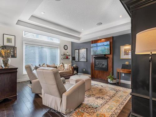 1 Irwin Cres, New Tecumseth, ON - Indoor Photo Showing Living Room With Fireplace